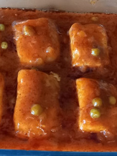 Una foto de 176. Lomos de merluza con tomate