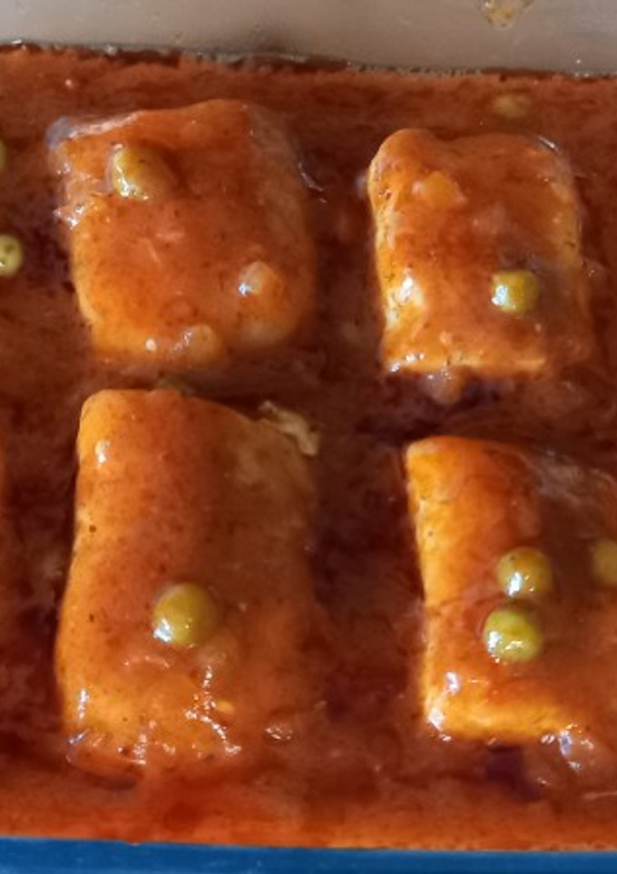 Una foto de 176. Lomos de merluza con tomate