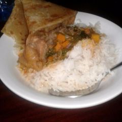 A picture of Rice beef with chapati.