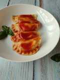 Ricotta and Basil Ravioli with Tomato Sauce
