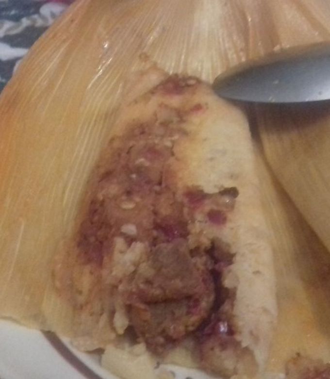 Una foto de Tamal de picadillo de cerveza y chile rojo las correa