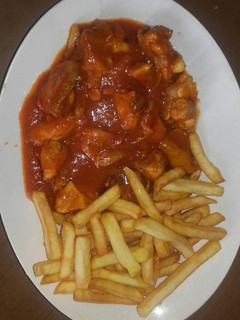 Una foto de Pollo en salsa de tomate