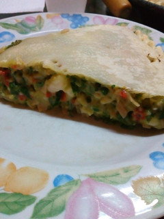 Una foto de Tarta de espinaca y salsa blanca