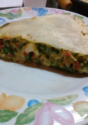 Una foto de Tarta de espinaca y salsa blanca