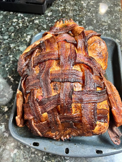 A picture of Bacon wrapped smoked Turkey.