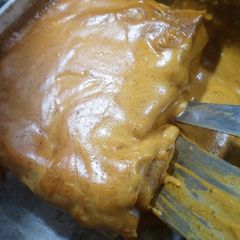 A picture of Chicken Enchiladas.