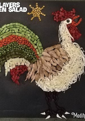 A picture of 10 layers chicken salad.