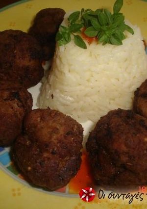 A picture of Keftedakia with ouzo.