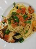 Spaghetti al granchio sfumato al cognac e cozze