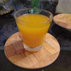 A picture of Summer special Orange mosambi juice.