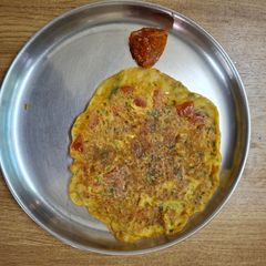 A picture of Tomato omlette.