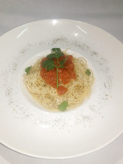 A picture of Spaghetti with tomatoe concase.