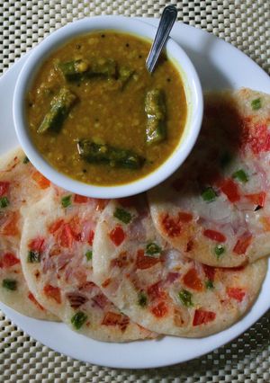 A picture of Onion Tomato Uthappam.