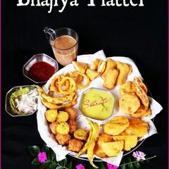 A picture of Bhajiya Fritters Platter with Masala Tea.