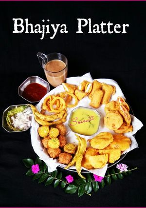 A picture of Bhajiya Fritters Platter with Masala Tea.