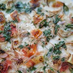 A picture of Tomato Onion Uttapam.