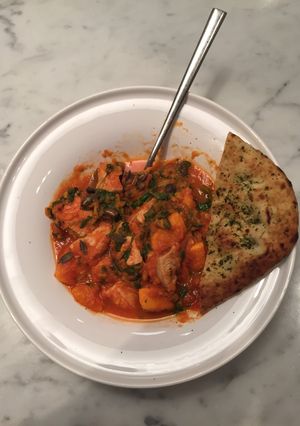 A picture of Spiced chicken, spinach and sweet potato stew.