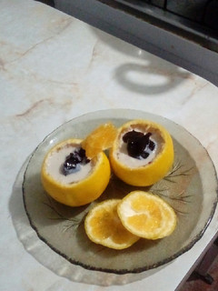 Una foto de Mandarinas con salsa de yogur