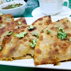 A picture of Palak Methi ka Cheesy paratha.