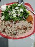Rice and beans with oil and salad