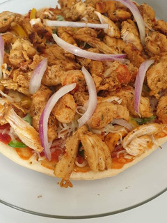 Una foto de Pizza de pollo sin horno