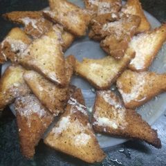 A picture of Shahi tukda coated with condensed milk.
