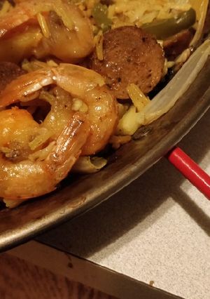 Una foto de Paella