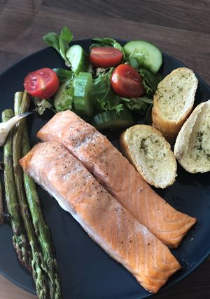 A picture of Salmon and asparagus.