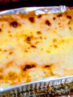 Una foto de Lasagna de pollo y maizitos