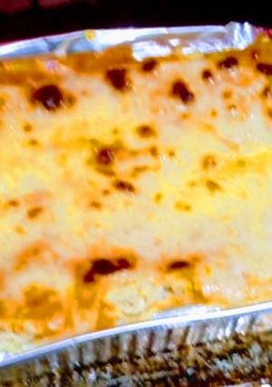 Una foto de Lasagna de pollo y maizitos