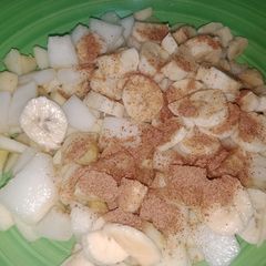 A picture of 3 fruits fruit chaat.