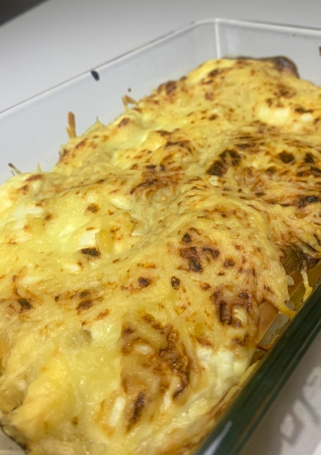 Una foto de Lasaña de pollo y queso