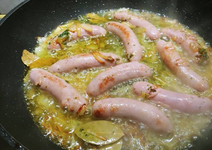 Foto principal de Longaniza de cerdo con anisete cúrcuma kebab y champiñones