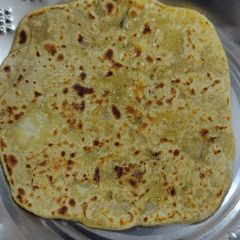 A picture of Aloo stuffed mint paratha.