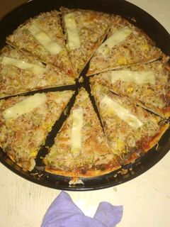 صورة لوصفة بيتزا لذيذة واقتصادية