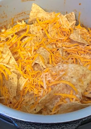 A picture of Upside down chicken nachos.