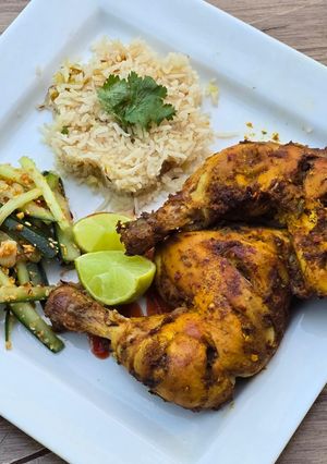 A picture of Spicy baked chicken quarters.