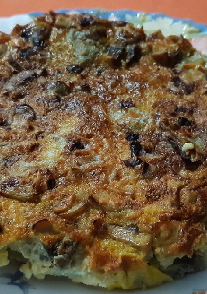 Una foto de Pastel de champiñones y alcachofas en airfryer
