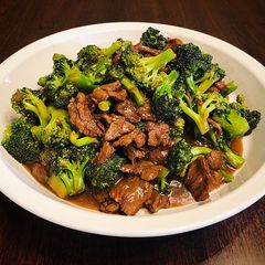 A picture of Sautéed Broccoli and Beef with Sesame Gravy.