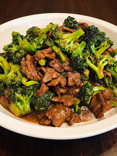 A picture of Sautéed Broccoli and Beef with Sesame Gravy.