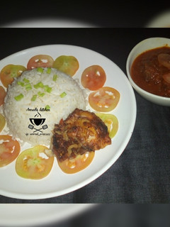 A picture of White rice and stew.