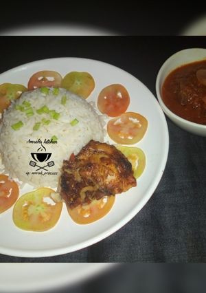 A picture of White rice and stew.