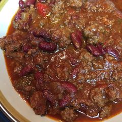 A picture of Crockpot taco soup with beer.