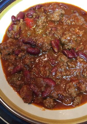 A picture of Crockpot taco soup with beer.
