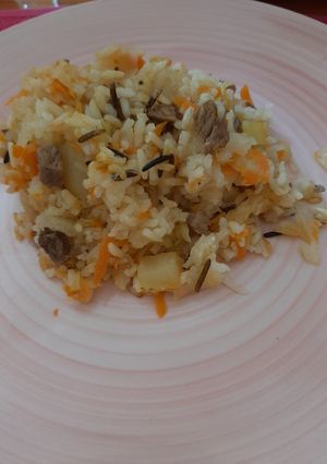 Una foto de Pilaf con res