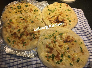 A picture of HOMEMADEYogurt & garlic Naan.