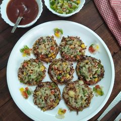 A picture of Mini Corn Pizza (Pizza With Corn Base).