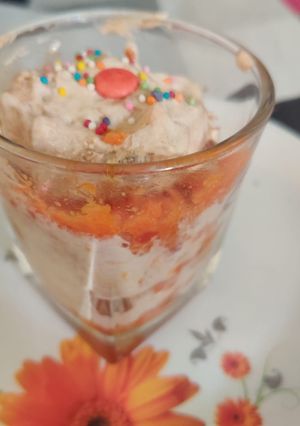 A picture of Carrot halwa dessert with icecream.