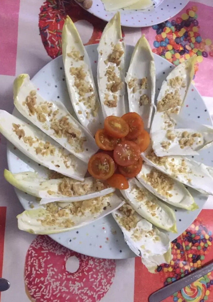 Una foto de Aperitivo de endivias