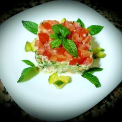 Zucchini and tomato salad a macedonian rice, tuna A picture of Zucchini and tomato salad a macedonian rice, tuna.